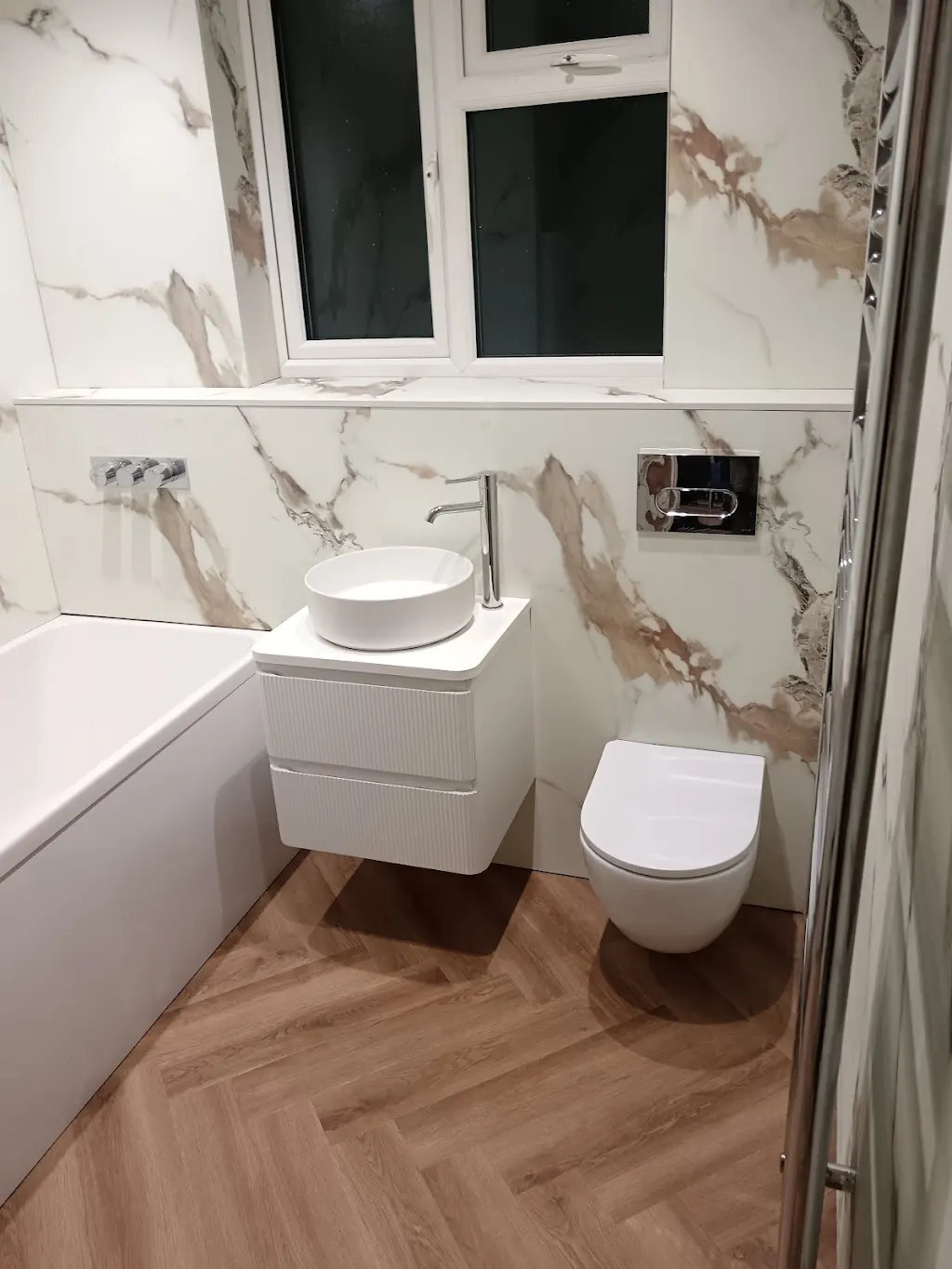 DW Plumbing Heating & Bathrooms at work